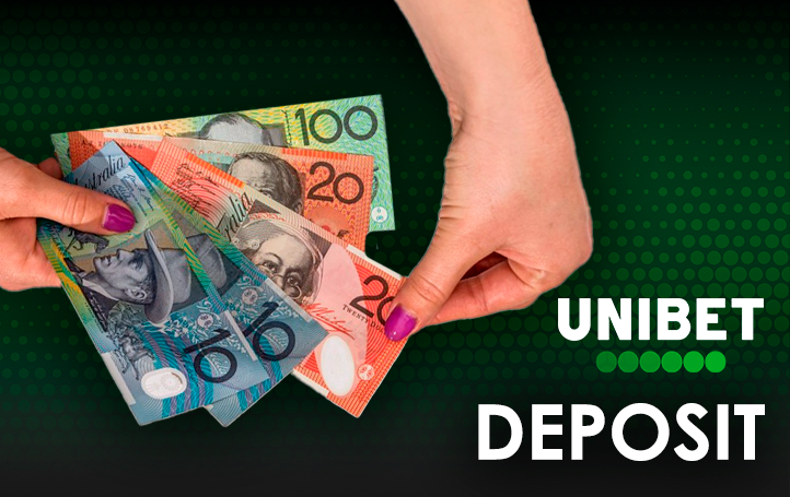 A hand holding Australian dollars and Unibet logo