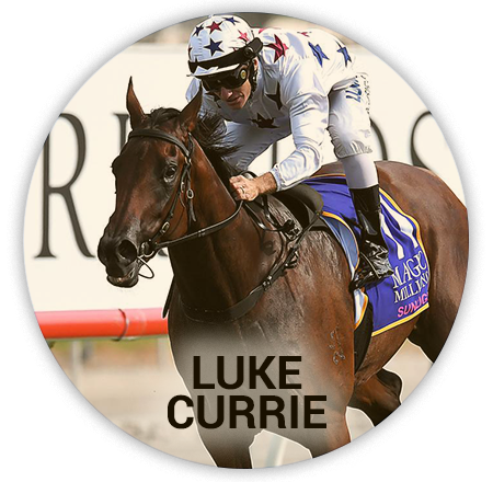 jockey in a white suit with stars participates in the races